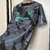 Camisa Barcelona Pré-Jogo 23/24 Torcedor Nike - Cinza Chumbo - comprar online