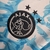 Camisa Ajax Pré-Jogo 23/24 Torcedor Adidas - Branca e Azul
