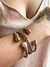 Bracelete torcido mix de banhos curvas cravejadas - comprar online