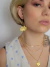 Colar triplo flower glam amarelo manteiga na internet