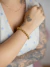 Pulseira esferas ouro M - comprar online