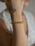Pulseira esferas ouro M na internet