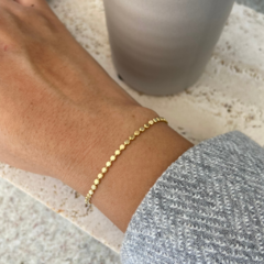 Pulseira com bolinhas achatadas - comprar online
