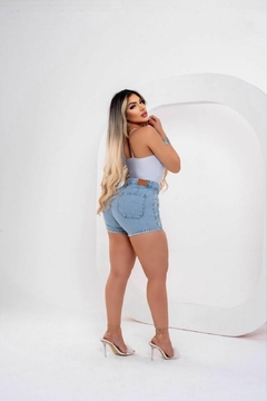 Imagem do Short Jeans Feminino Sem Lycra, Cintura Alta Detalhe De Bordado Lateral, Revesst Jeans. 40700