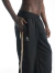 JOGGER JAIDER NEGRO ROMPEVIENTOS - RESUELTO