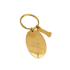 Llavero ovalado con dije de hueso dorado 3.5cm. - ALV014 - comprar en línea