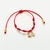 Pulseira Vermelha 7 Nós com Pingente Estrela do Mar + Âncora na internet