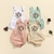 Jardineira Bebê Linho Bordada Rosè + Brinde - Muum Baby - Tricot personalizado para crianças de 0 a 8 anos
