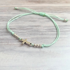 Pulsera Cruz verde agua en internet