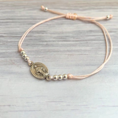 Pulsera Virgen rosa claro en internet