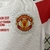 Kit Infantil Manchester United Away 2010/11 Retrô - Branco - loja online