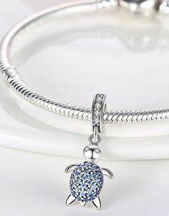 Charm tortuga brillo