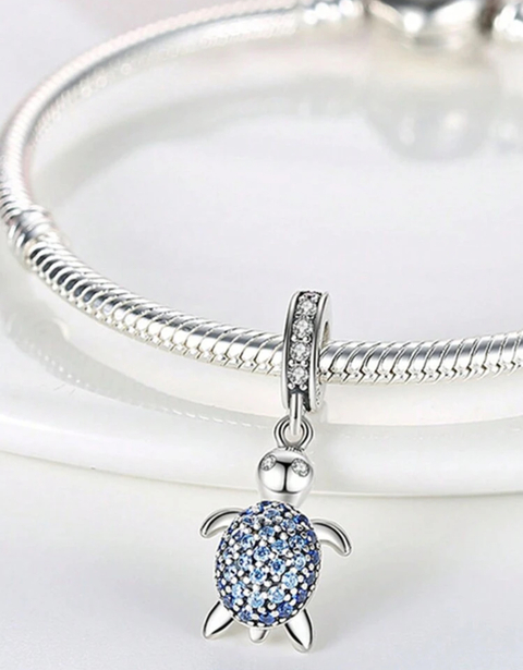 Charm tortuga brillo