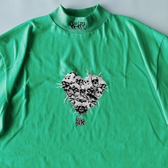 Remera con cuello HB verde agua en internet