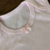 Body Regata Rosa na internet