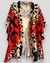 kimono estampa geometrica, fundo nude e coral quente com desenhos em preto de passaro, lua e sol como se fossem pinturas. linda