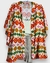 kimono estampado com losangos coloridos em tons de rosaclaro , laranja e verde em fundo marfim