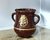Caneca Harry Potter Poção Hogwarts Dourada - comprar online