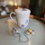 CONJUNTO CANECA EM PORCELANA COM TAMPA E INFUSOR DE CHÁ COM CAIXA DE PRESENTE na internet