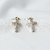 Par de Brincos Argola Cruz Cravejada em Zircônia - Banhada a Ouro 18k - loja online