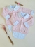 Cardigan bebê em tricô rosa. - comprar online