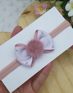 Mini cruzado com strass e pelúcia. na internet