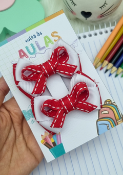Laço mini cruzado duplo escolar. na internet