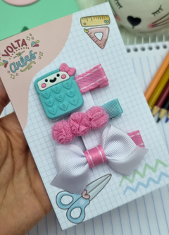 Trio de hair clips calculadora escolar.