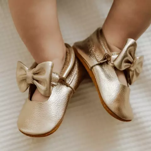 Sapatilha Dourada Moccs Baby
