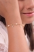 Pulseira com Pérolas e Cruz