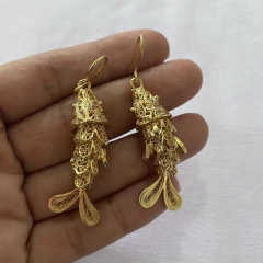 Aretes peces articulados
