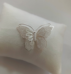 Prendedor mariposa en internet