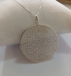Dije círculo de caracoles 4,0 cm