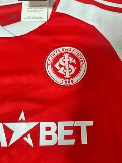 Camisa Internacional I 24/25 Feminina na internet