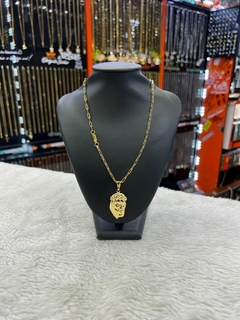 Corrente aço/banhado dourado.