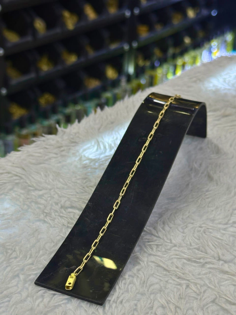 Pulseira Cartier moeda.