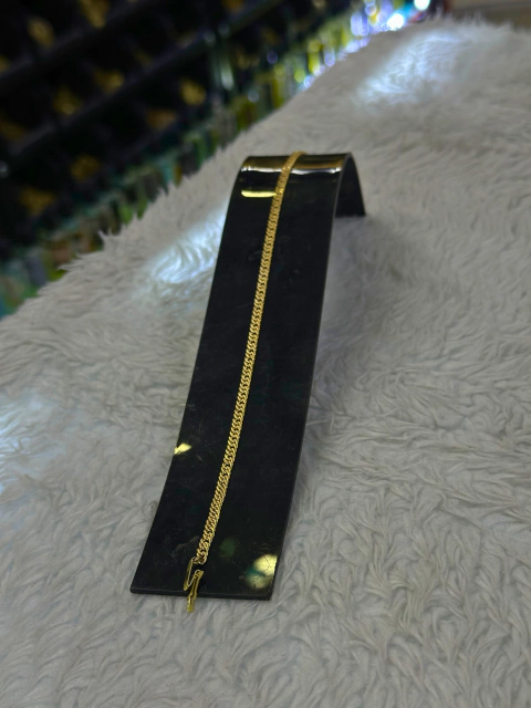 Pulseira grumet moeda.