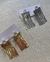 Brincos/unid