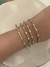 Braceletes fininhos com pedrinhas cristais folheados