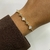 Pulseira trevo madre perola com zirconias