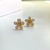Brinco florzinha G ouro na internet