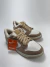 Tênis Nike Dunk Low Bege na internet