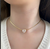 Choker Fita com Coração de Zircônia Banhado a Ouro 18k