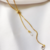 Colar Gravatinha Pontas de Zircônias Banhado a Ouro 18K - comprar online