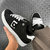 Tênis Qix Skate Combat Suede Preto E Branco - comprar online