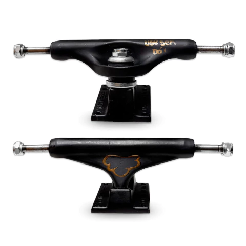 Truck De Skate Essência Hollow Vazado Sólido Black Logo Dourada - comprar online