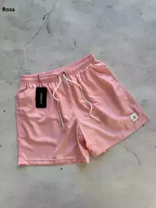 SHORT DE BAÑO LISO CON BOLSILLOS ROSA VIEJO