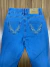 CALÇA FEMININA MINUTY COM DESENHO DE CAVALO BORDADO