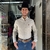 CAMISA THANKFIELD MASCULINA MANGA LONGA CINZA COM BOLSO na internet
