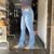 Calça Feminina Azul Desfiada Boot Cut American Country na internet